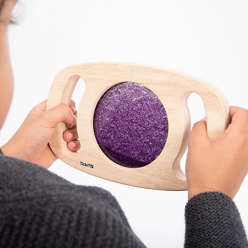 Panel Sensorial de Madera con Asas Purpurina lila  - Aúpa Organics